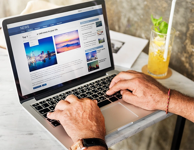 elderly man using laptop